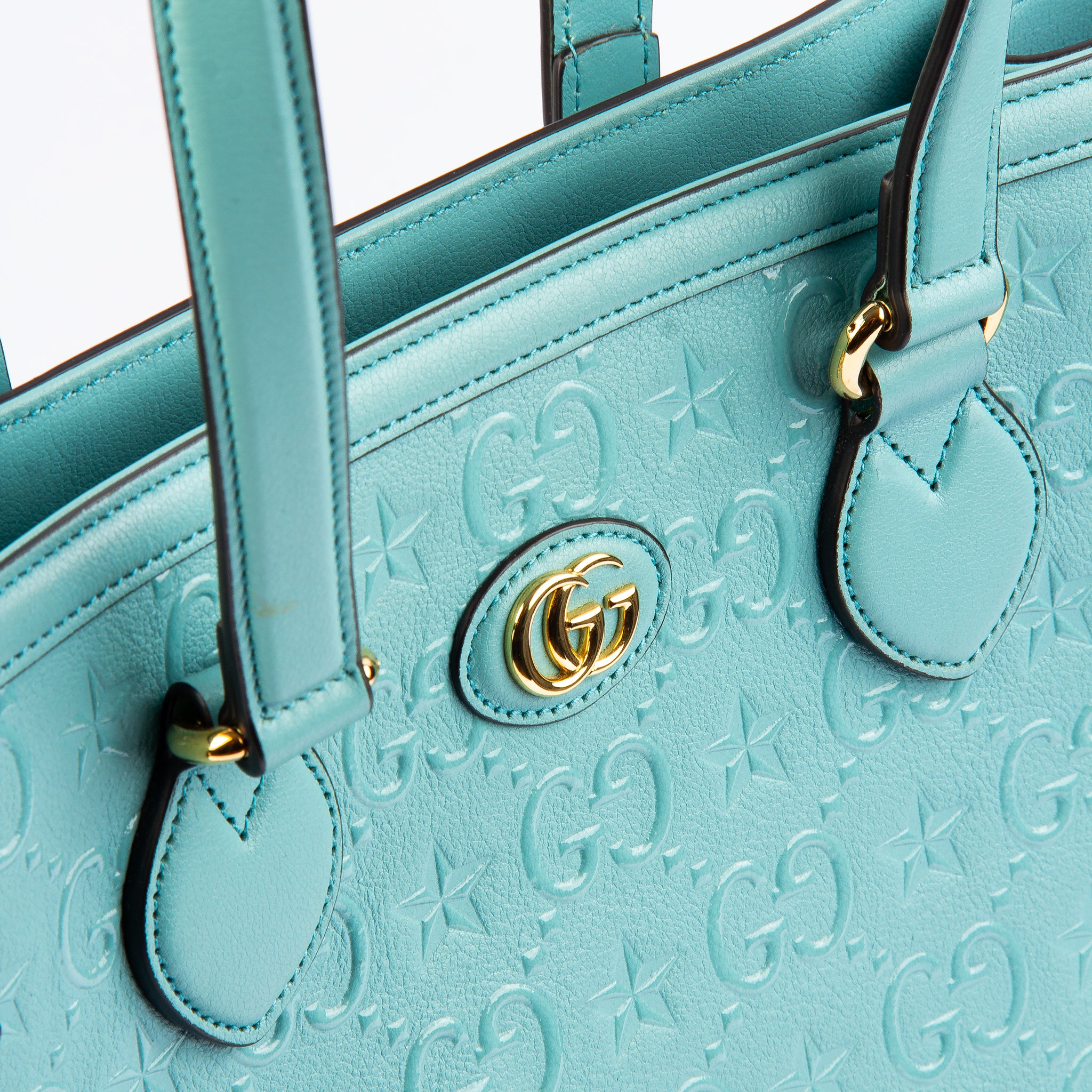 Gucci GG Star Embossed Medium Shoulder Bag