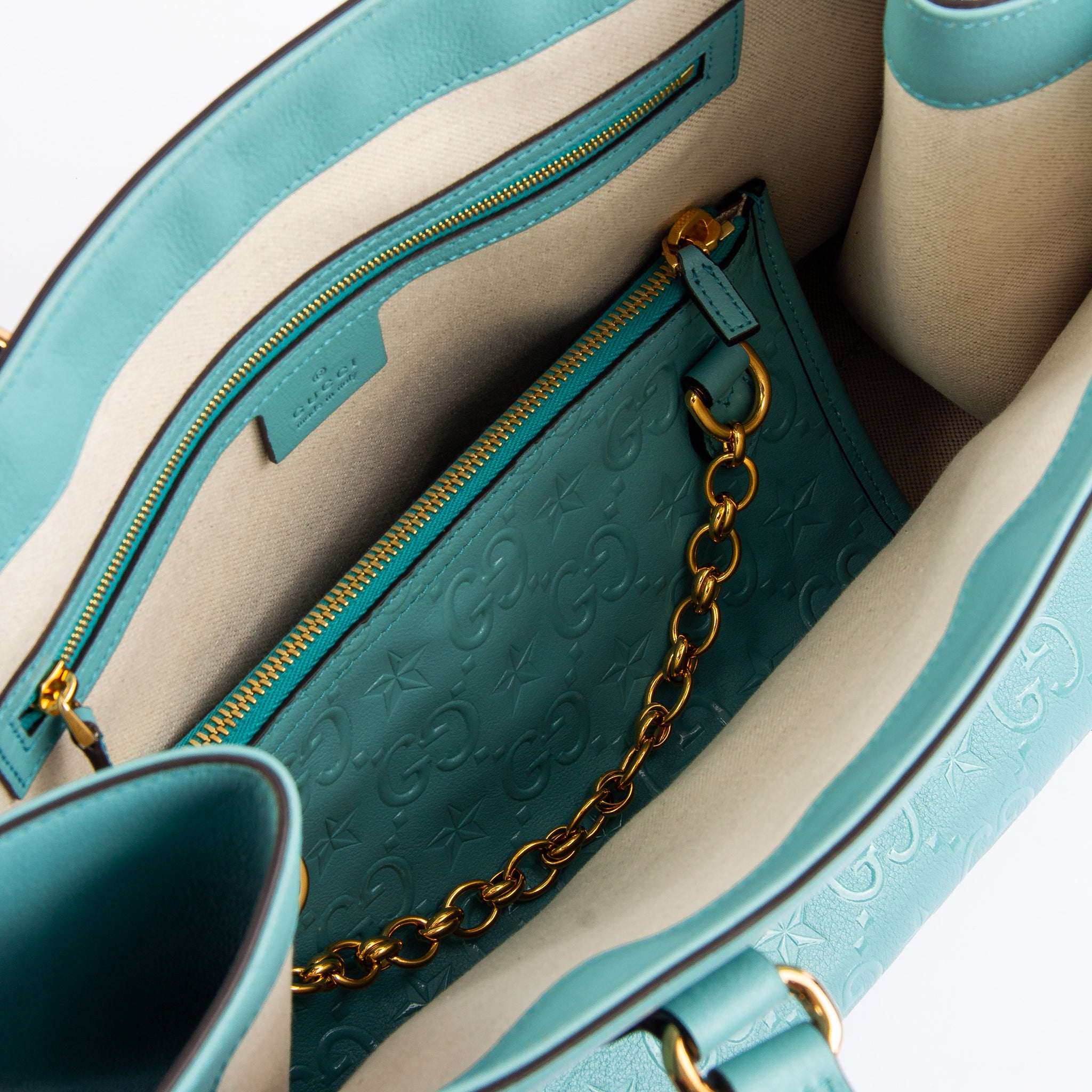 Gucci GG Star Embossed Medium Shoulder Bag